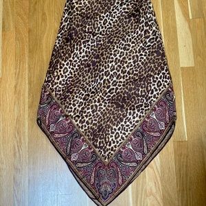 100% silk midi skirt. super flattering triangular cut. zipper in the back.